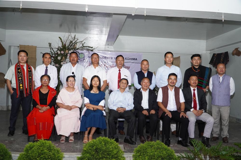 Board members of the Ashikho Daili Trust Award for Academic Excellence along with the topper, Pikuni Pauline, and President NSF, President MUK, President MSUK, and others.