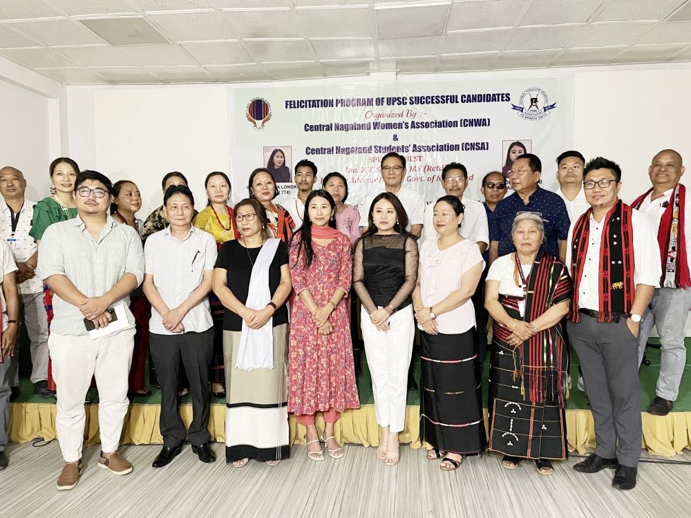 Tolino Chishi and Imsurenla Longkumer, two of the four successful candidates from Nagaland who cleared the UPSC 2023 exams, with others at a felicitation programme organised by the Central Nagaland Women's Association and Central Nagaland Students’ Association in Dimapur on May 23. (Morung Photo)