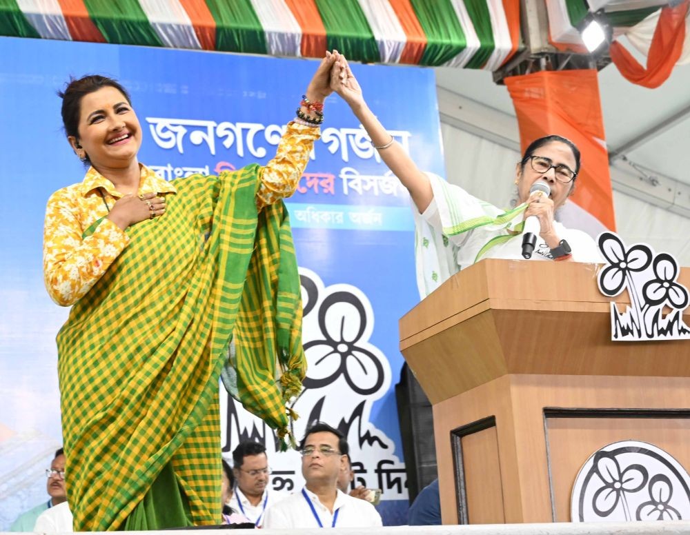 Hooghly : West Bengal Chief Minister Mamata Banerjee with TMC candidate Rachana Banerjee during a public meeting for the Lok Sabha elections, at Balagarh, in Hooghly district, Wednesday, May 8, 2024.(IANS)