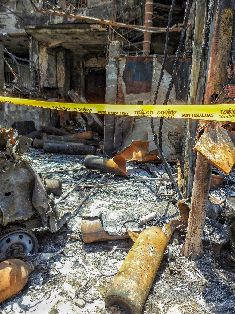 Charred remains of equipment outside Baby Care New Born Hospital where a fire broke out on Saturday night at Vivek Vihar area. Seven newborns, who were rescued after the fire, have died, officials said, in New Delhi, Sunday, May 26, 2024.(Photo: IANS/Anupam Gautam)