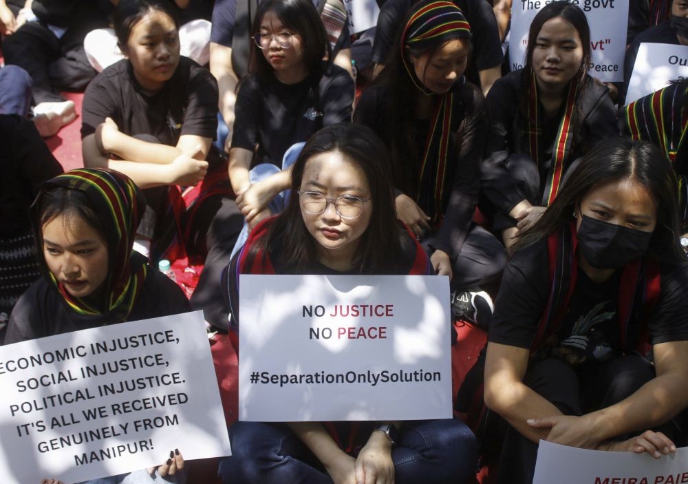 New Delhi: Members of UNAU Tribal Women's Forum stage a protest over the ethnic violence that broke out between the Kuki and Meitei communities on May 3, 2023, in Manipur, at Jantar Mantar in New Delhi on Saturday, May 4, 2024. (Photo: IANS/Qamar Sibtain)