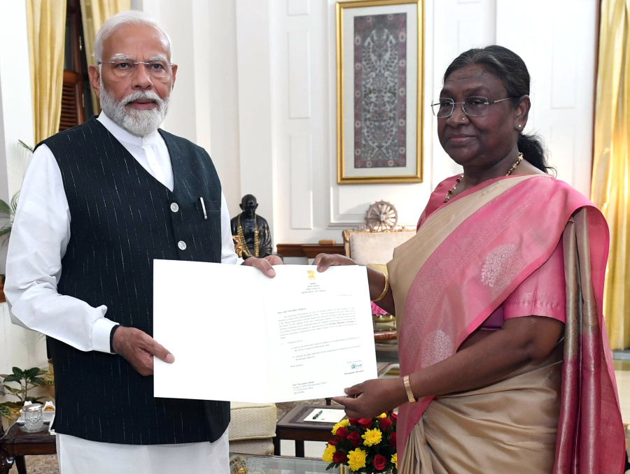 Prime Minister Narendra Modi meets President Droupadi Murmu at the Rashtrapati Bhavan and stakes claim to form the government, in New Delhi, Friday, June 07, 2024. He was chosen as the leader of the NDA Parliamentary Party today.(IANS)