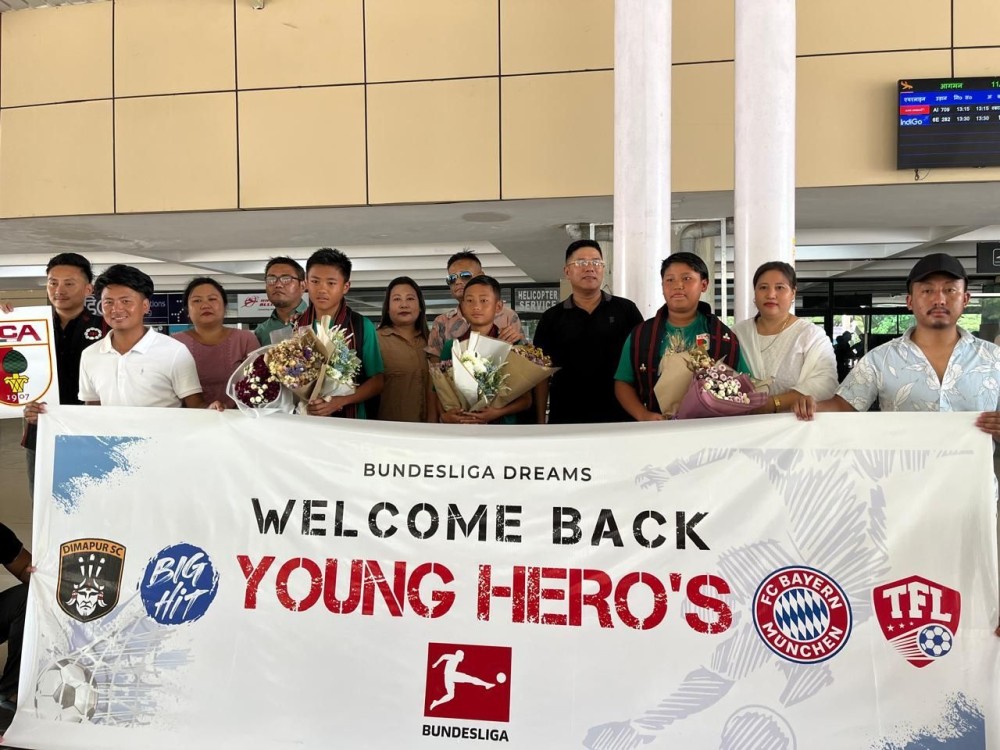 Left to right, Lalminkai Thomson, Asa Ayemi and Nitoka Tamang at Dimapur airport after returning back from a week long training camp at Eintracht Frankfurt, Germany. (Morung Photo)