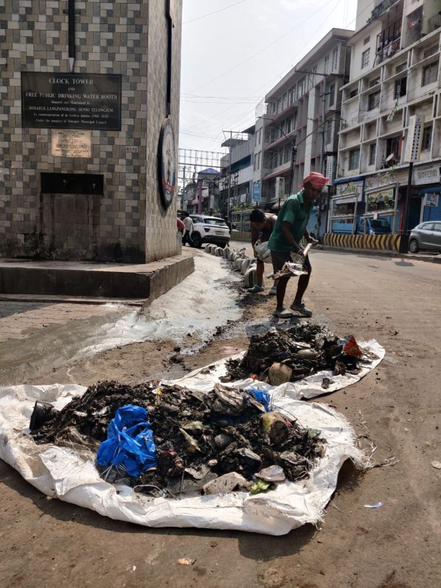 The Dimapur Langpangkong Senso Telungjem cleaned and renovated the clock tower cum free public drinking water booth located near the entrance to New Market Dimapur on June 2. (Photo Courtesy: DLST)