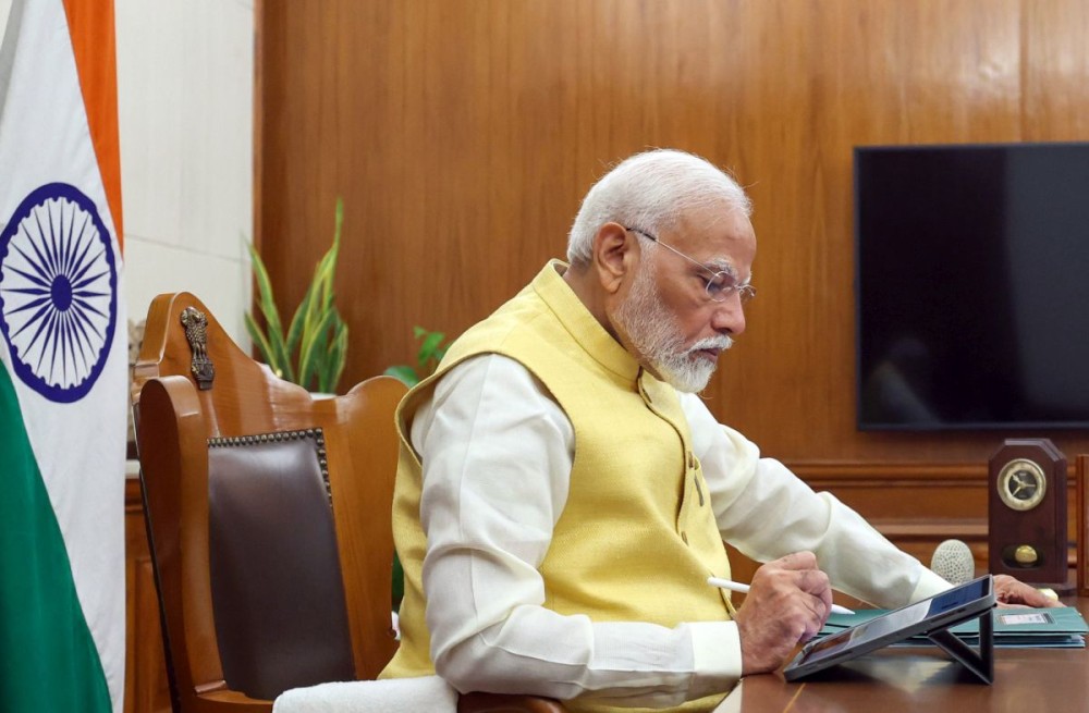 New Delhi : Prime Minister Narendra Modi signs his first file authorising the release of the 17th instalment of PM Kisan Nidhi after assuming charge as the PM for the third successive term, in New Delhi on Monday, June 10, 2024. This will benefit 9.3 crore farmers and distribute around Rs 20,000 crores.(IANS/PIB)