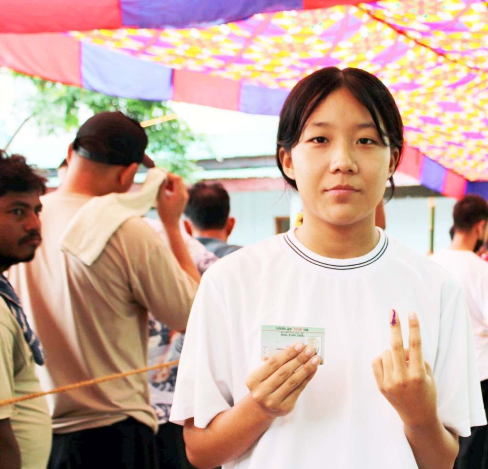 A young voter exercising her right to vote during the ULB re-polling at Polling Station-4, Ward-20, Dimapur on June 28. (DIPR Photo)