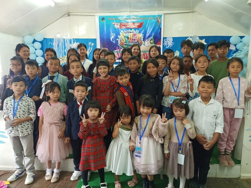 Sunday school children posing after the service on June 30 at KLBC D.Block, Kohima.