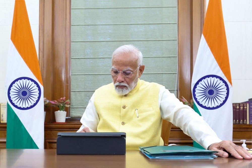 New Delhi : Prime Minister Narendra Modi signs his first file authorising the release of the 17th instalment of PM Kisan Nidhi after assuming charge as the PM for the third successive term, in New Delhi on Monday, June 10, 2024. This will benefit 9.3 crore farmers and distribute around Rs 20,000 crores.(IANS/PIB)