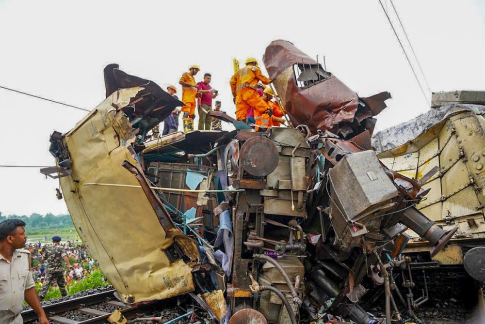 Darjeeling : Rescue operations underway after a goods train hit the Kanchanjunga Express travelling from Silchar, Assam to Sealdah, West Bengal from behind, in Darjeeling on Monday, June 17, 2024.Three compartments of the express train derailed under the impact of the collision. (IANS/X/@INCIndia)