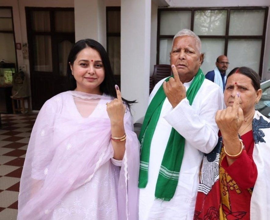 Patna: RJD chief Lalu Prasad Yadav with wife Rabri Devi and daughter Rohini Acharya after casting his vote during the seventh and last phase of Lok Sabha elections, in Patna, Saturday, June 1, 2024.(IANS/X/@RohiniAcharya2)