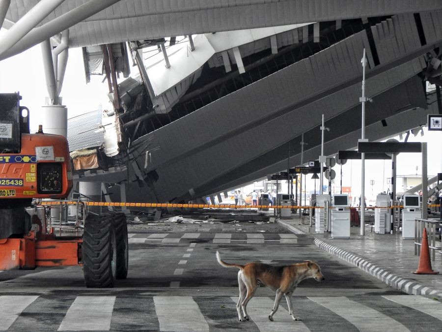 A portion of canopy collapsed at Delhi airport's Terminal-1 after heavy railfall in New Delhi on Friday, June 28, 2024.(IANS/Anupam Gautam)