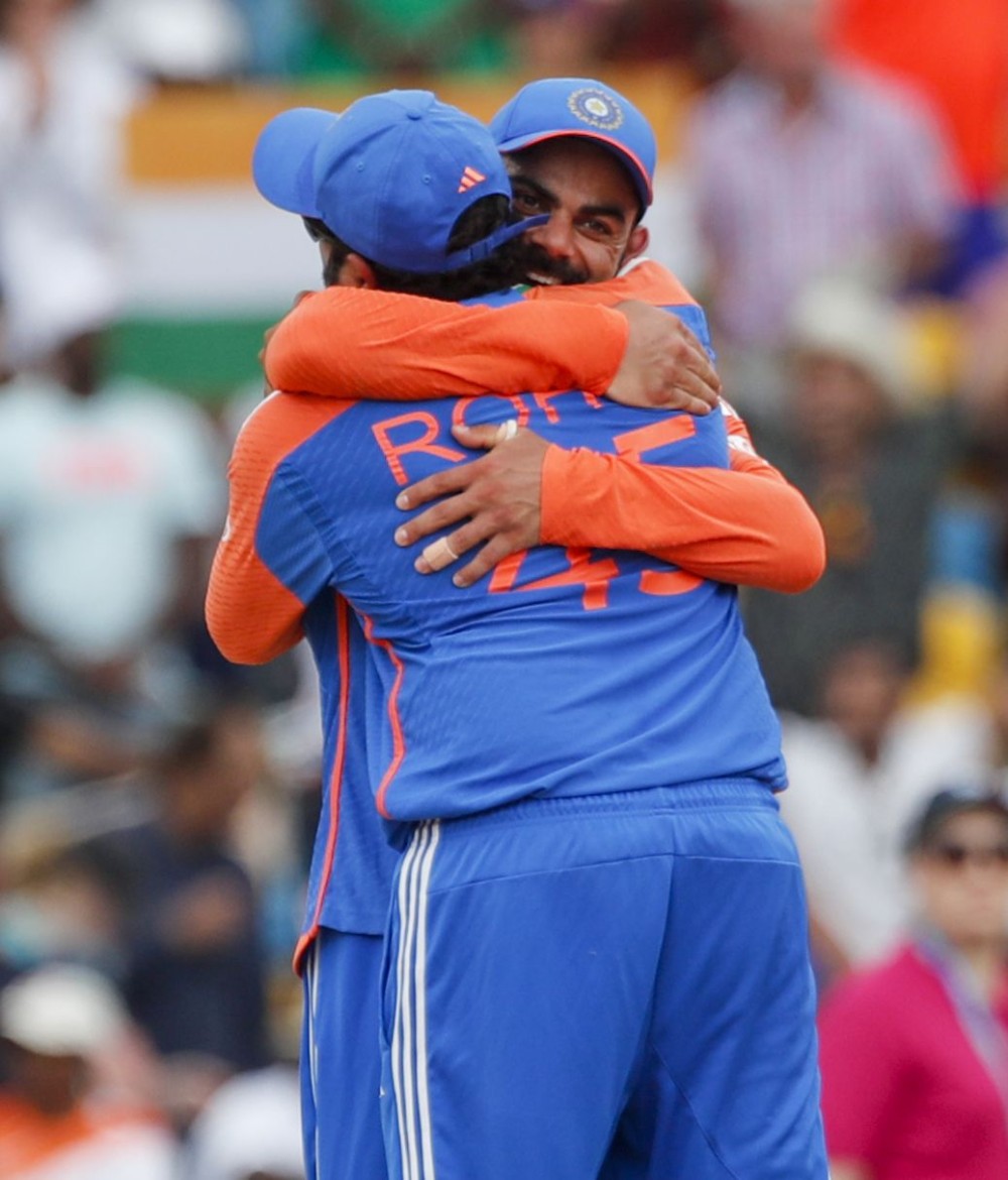 Barbados : India's captain Rohit Sharma hugs teammate Virat Kohli after India won the ICC Men's T20 Cricket World Cup Final match against South Africa at Kensington Oval in Barbados on Saturday, June 29, 2024. (Photo: IANS)