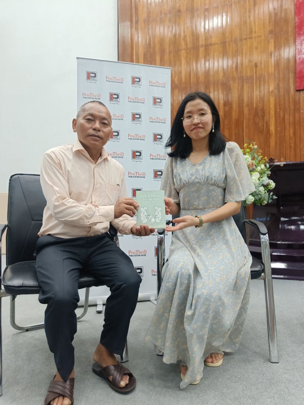 Author of 'Milk & Honey for the soul,' A Lumtsala Sangtam with special guest, Rev Thridong, Pastor, Sangtam Baptist Church Dimapur (SBLD) after the book launch at the church premises on July 1. (Morung Photo)