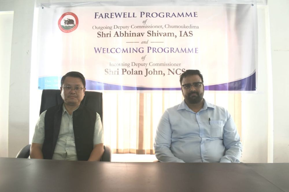 Outgoing DC, Abhinav Shivam, IAS, and incoming DC, Polan John, NCS, during the farewell program held at DPDB Hall, DC Office, Chumoukedima on July 31.