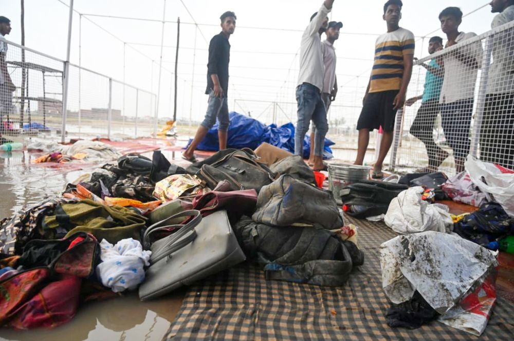 Hathras: Belongings of victims at the Hathras stampede incident site, where 121 people died during a congregation yesterday, at Fulrai village in Hathras on Wednesday, July 3, 2024. (Photo: IANS/Ramesh Sharma)