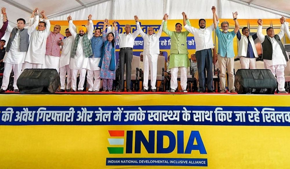 Delhi Chief Minister Arvind Kejriwal's wife Sunita Kejriwal, Punjab Chief Minister Bhagwant Mann, CPI General Secretary D. Raja, NCP (Sharadchandra Pawar) President Sharad Pawar, Shiv Sena (UBT) MP Sanjay Raut, CPI-ML National secretary Dipanker Bhattacharya, AAP leader Sanjay Singh and other leaders during INDIA bloc protest against Kejriwal's arrest and deteriorating health concerns at Jantar Mantar in New Delhi on July 30. (IANS Photo)