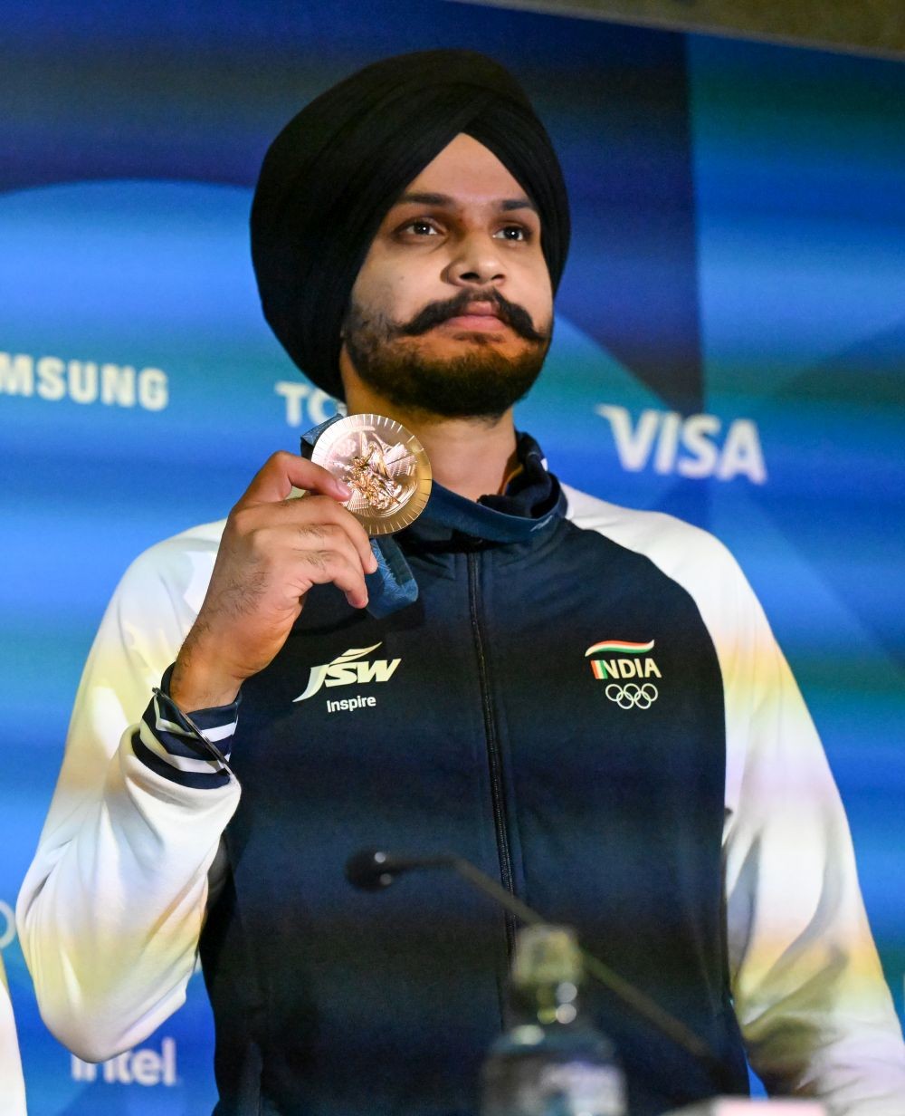 Chateauroux : India's bronze medalis Sarabjot Singh poses for photos during a press conference following the 10m air pistol mixed team event, in Chateauroux, France on Tuesday, July 30, 2024. (Photo: IANS/Biplab Banerjee)