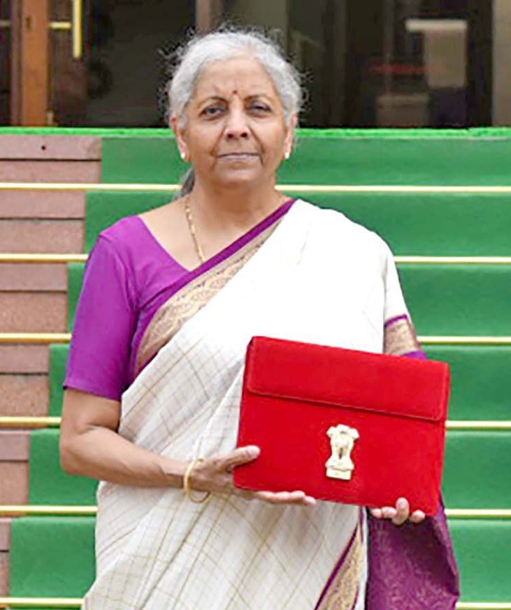 New Delhi: Union Finance Minister Nirmala Sitharaman carrying the Budget tablet poses for photos as she arrives at Parliament House to present the Union Budget 2024 in New Delhi on Tuesday July 23, 2024. (Photo: IANS/PIB)