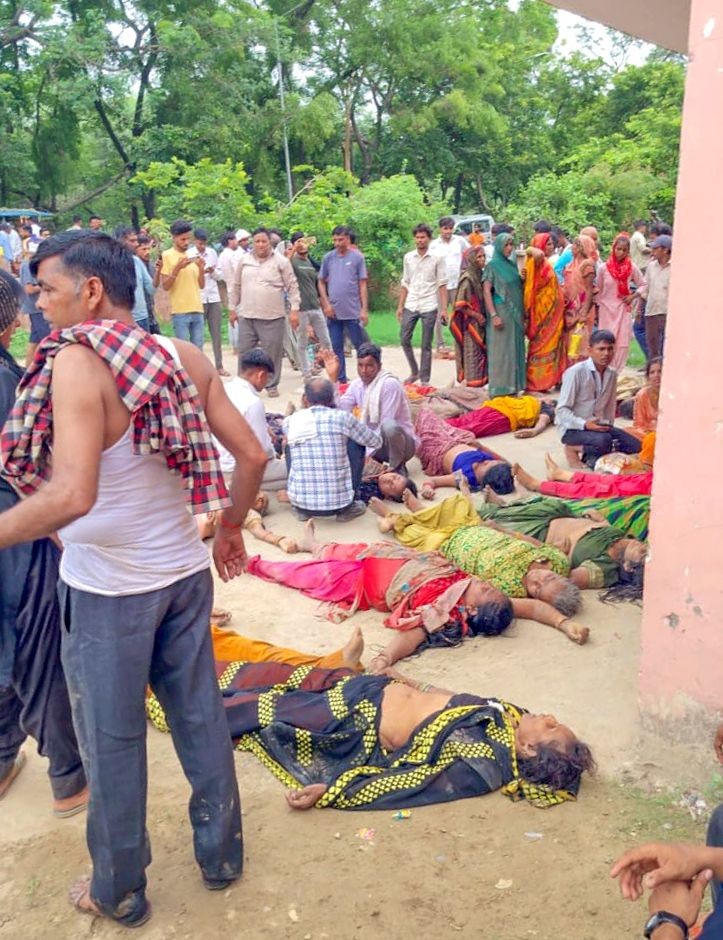 Hathras: Bodies of victims from a stampede at a religious event in UP's Hathras are seen outside a hospital, Tuesday, July 2, 2024. (IANS)