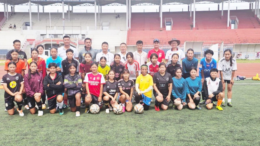 Nagaland Football Association (NFA) officials and others with the participants of selection trail for the Senior Women’s National Football Championship 2024-25 at Indira Gandhi Stadium, Kohima on July 29.