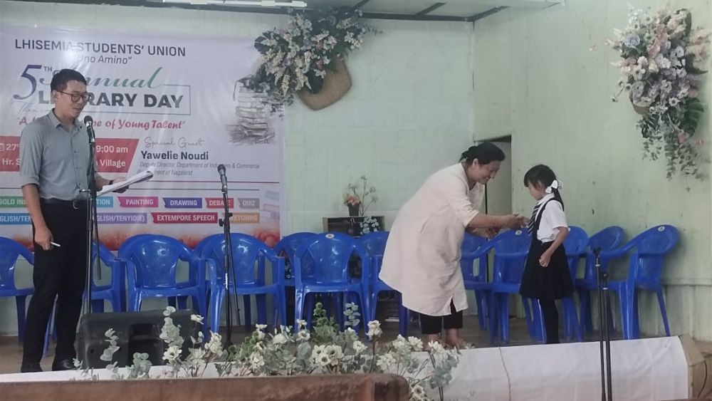 One of the winners receiving the prize during the LSU annual literary day on July 27.