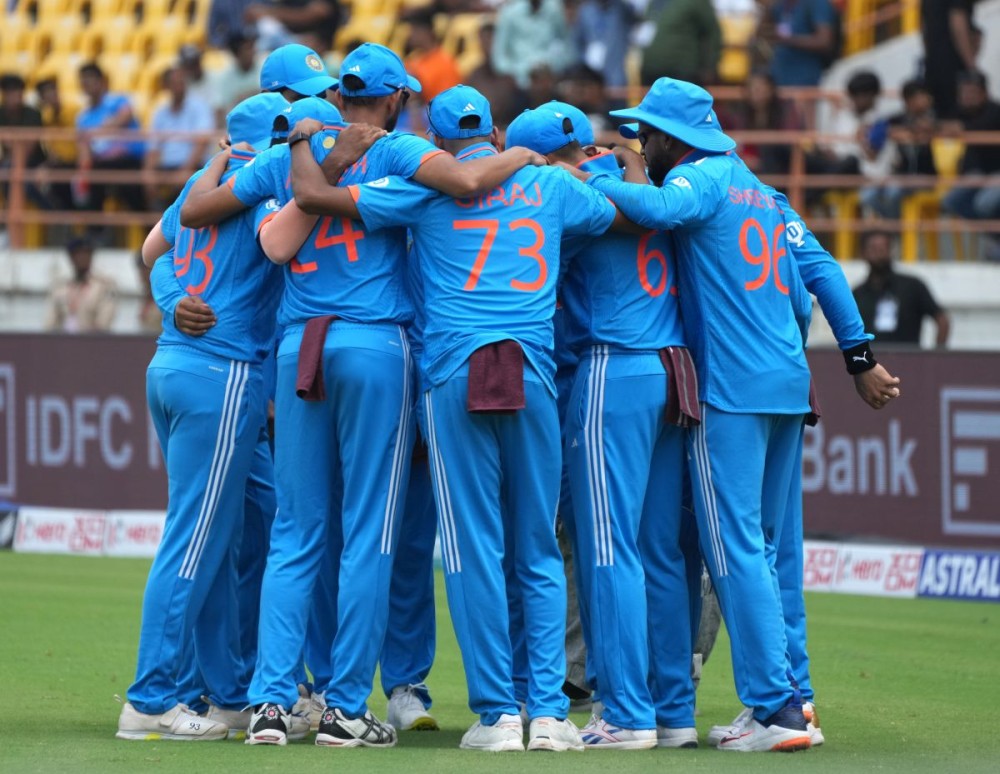 Rajkot : Indian players huddle before the start of the third ODI cricket match between Australia and India in Rajkot ob Wednesday, September 27, 2023. (Photo: IANS/Siddharaj Solanki)