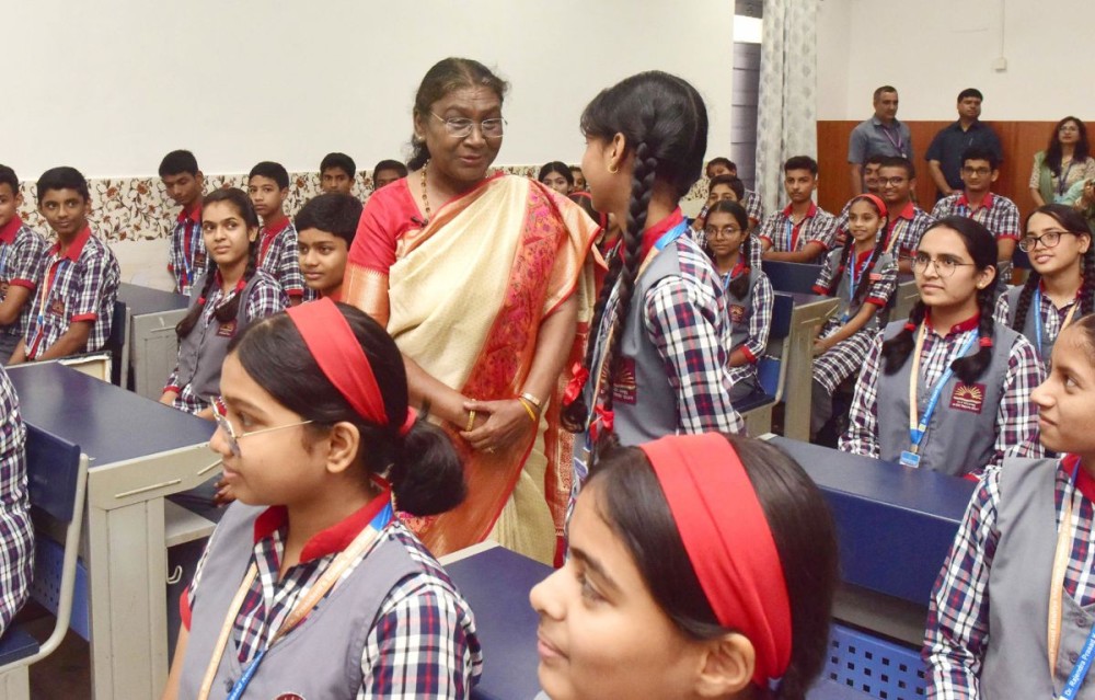 New Delhi: President of India Dropdi Murmu interacts with the student of Class IX of Dr. Rajendra Prasad Kendriya Vidyalaya on the completion of 2 years of Presidency at Rashtrapati Bhavan in New Delhi on Thursday July 25, 2024.(IANS/PIB)