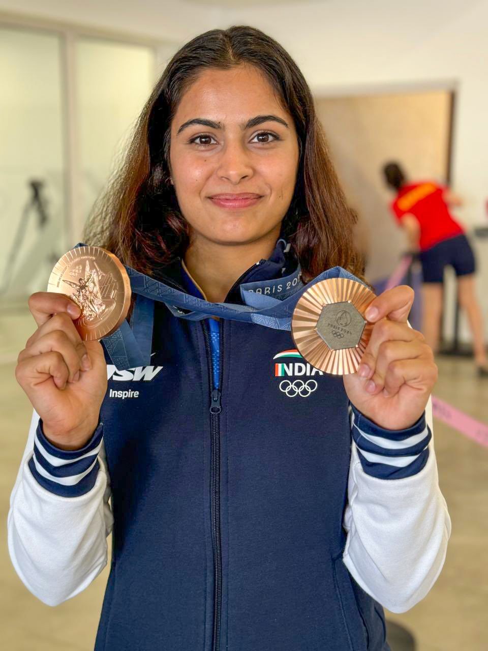 Chateauroux: India's Manu Bhaker poses with her two bronze medals won at the Paris 2024 Olympics, in Chateauroux, France, on Tuesday, July 30, 2024. (Photo: IANS/@realmanubhaker)