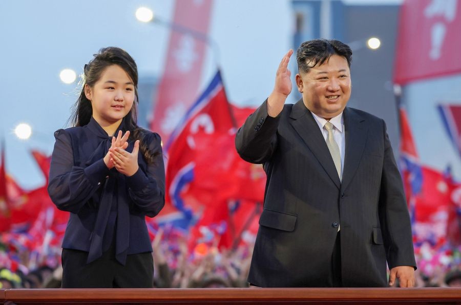 North Korean leader Kim Jong-un and his daughter, Ju-ae, attend a ceremony marking the completion of a new modern street in northern Pyongyang on May 14, 2024, in this photo carried by the North's state Korean Central News Agency.(IANS/Yonhap)