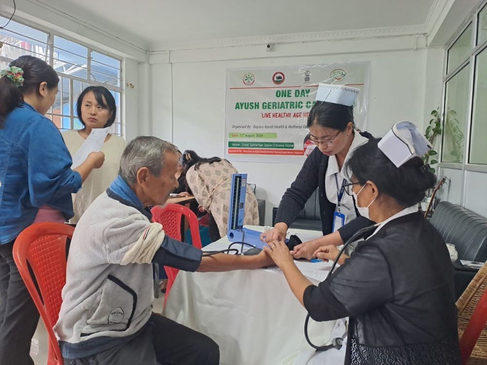 A senior citizen getting a health check up during one of the camps.