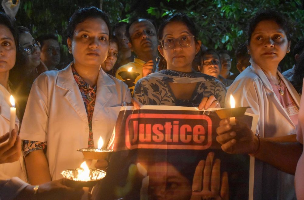 Moradabad: Doctors take part in a candle march against the rape and murder of a young medic at RG Kar Medical College, Kolkata on in Moradabad Saturday August 17, 2024. (Photo: IANS/Phool Chandra)