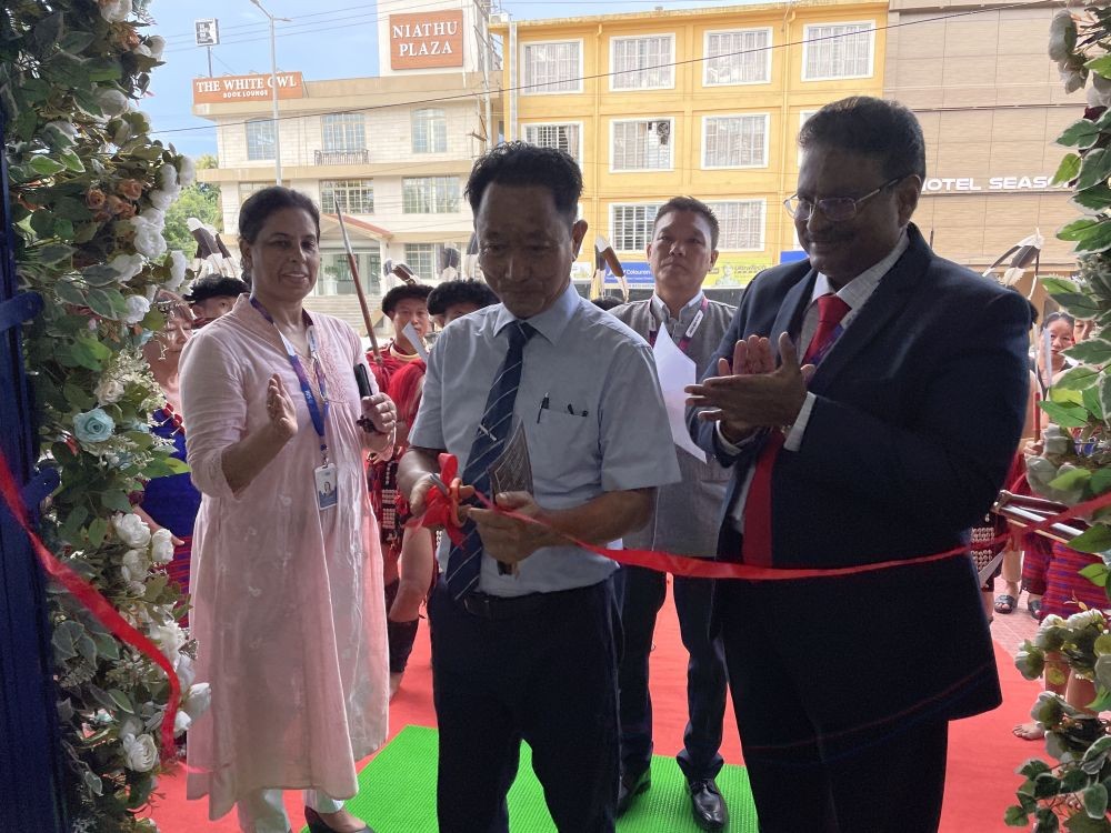 Lhousito Khro, Chairperson, Chümoukedima Town Council, inaugurating the 7th Mile branch of the SBI, in Chümoukedima, as the Chief General Manager, Guwahati Circle, SBI, Sahadevan Radhakrishnan looks on. (Morung Photo)