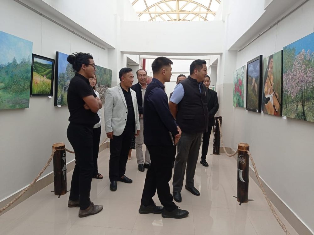 NLA Speaker Sharingain Longkumer along with members of the Local Colors Nagaland taking a glimpse of the art exhibition at Central Plaza building on August 19. (Morung Photo)
