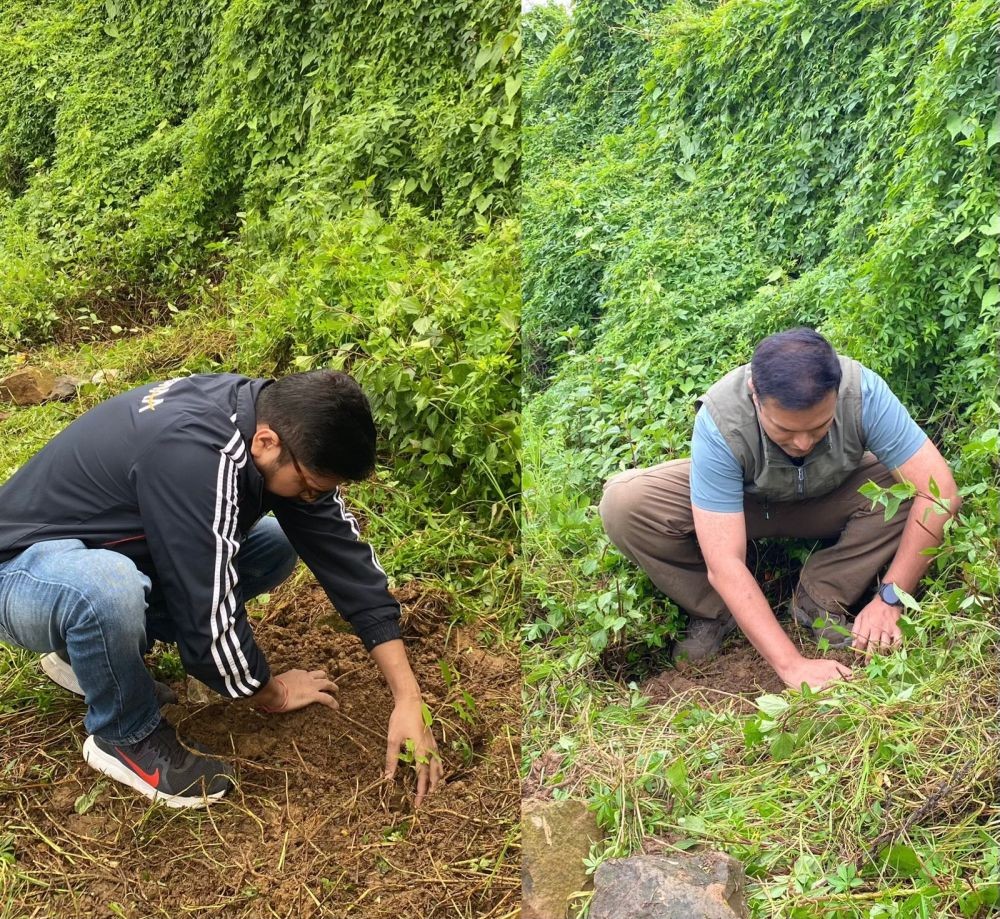 DC Wokha Vineet Kumar, Suman WM Sivachar, DFO, Wokha Forest Division planting tree saplings. (Morung Photo)