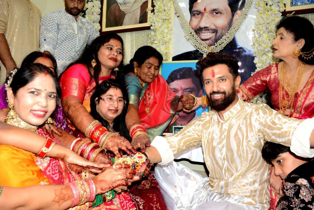 Patna: Union Minister Chirag Paswan celebrates the festival of Raksha Bandhan with sister's in Patna on Monday August 19, 2024.(Photo: IANS)