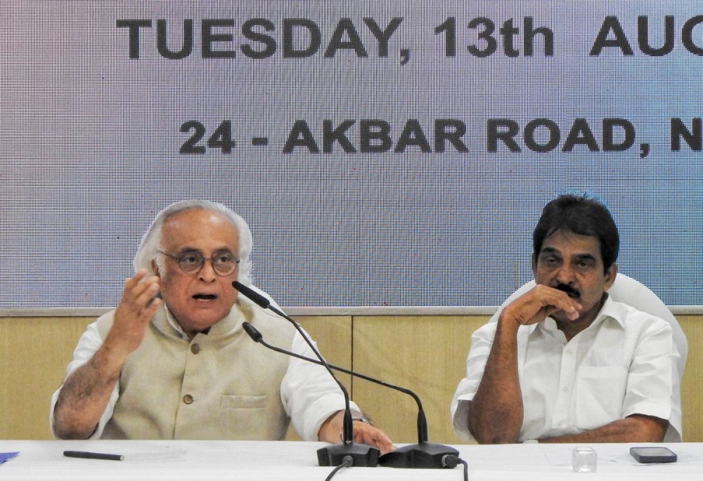 New Delhi: Congress leader Jairam Ramesh and General Secretary KC Venugopal, addreses media after PCC meeting at Congress headquarter in New Delhi on Tuesday August 13, 2024. (Photo: IANS/Anupam Gautam)