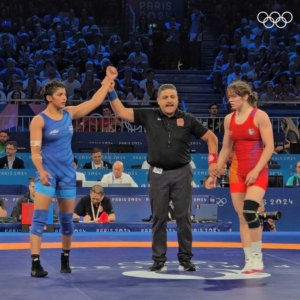 Wrestler Nisha Dahiya (in blue) in quarters with 6-4 win over Ukraine’s Tetiana Sova in women’s 68kg freestyle in 33rd Olympic Games in Paris, France, on Monday. IANS Photo