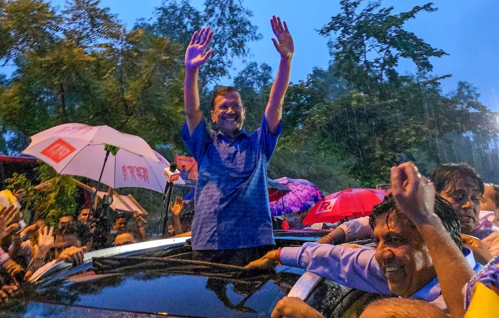 New Delhi: Delhi Chief Minister and AAP's national convener Arvind Kejriwal waves to the party workers after being released from Tihar Prison, following the Supreme Court’s grant of bail in the alleged excise policy case, in New Delhi on Friday, September 13, 2024. (Photo: IANS/Anupam Gautam)