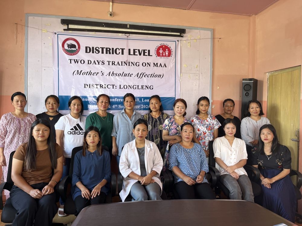 Participants posing with the resource person Dr Sanuzolu.