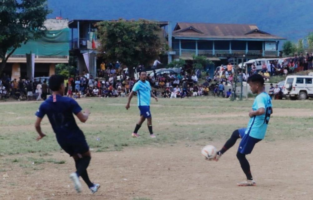 Players in action on day 6th of the ongoing 10th edition of Pochury Black Day Memorial Cup 2024 at Meluri town. (Morung Photo)