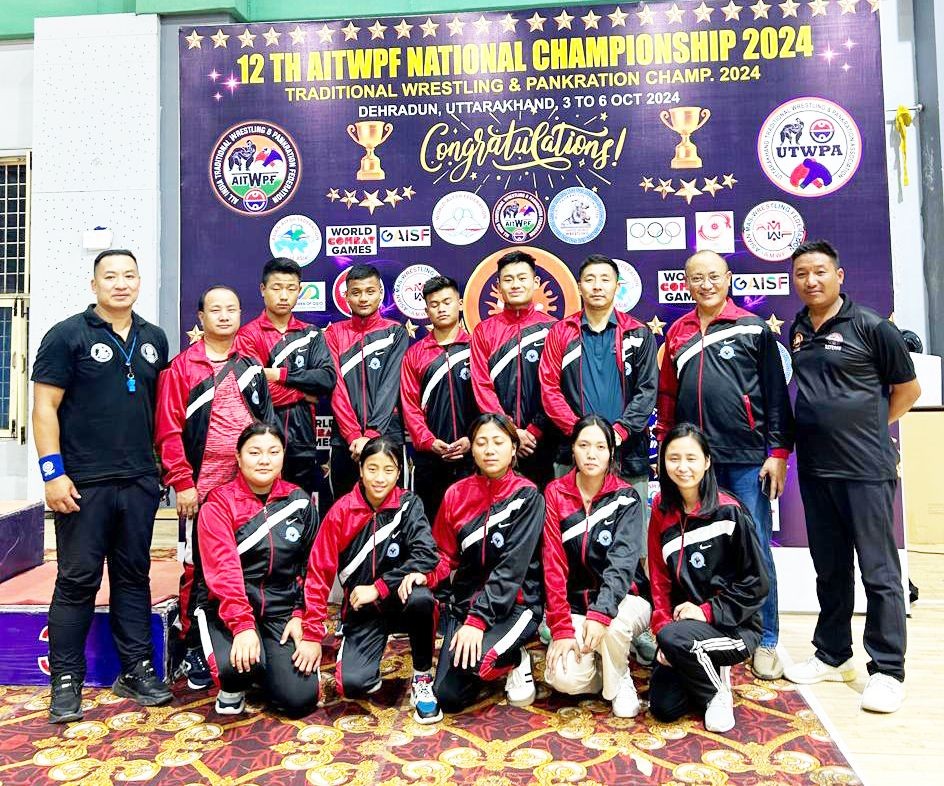 Medal winners pose with NWA officials and referees right after the day’s matches conclude.