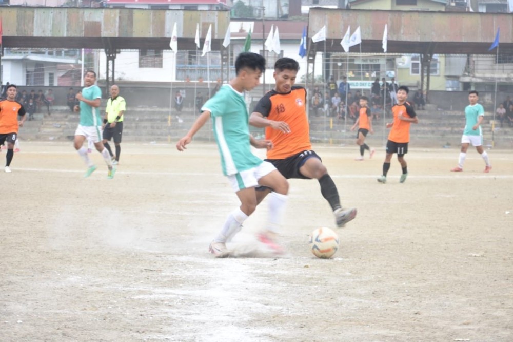 Players of Eastern Wings (Orange jersey) and LYM (Teal Green Jersey) in action during the ongoing MDFA Trophy 2024 at Imkongmeren Sports Pl Complex Mokokchung on October 18.