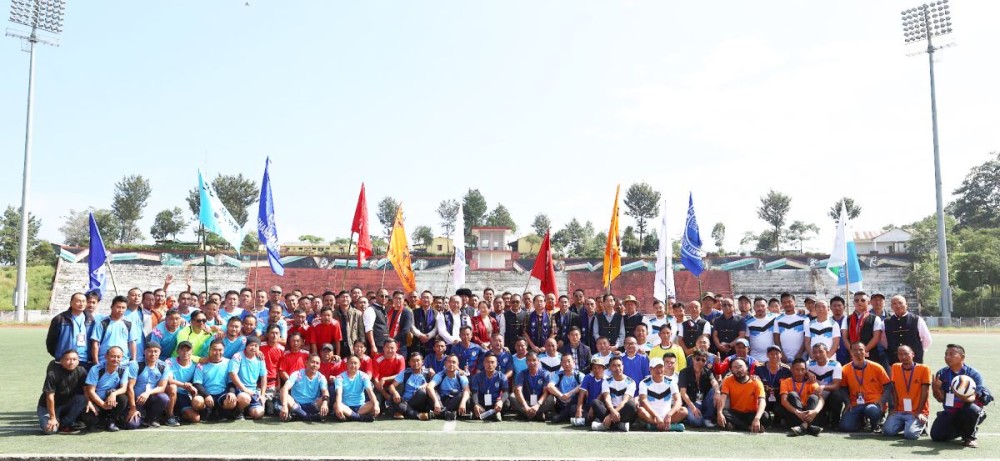 Dignitaries with participants of annual inter colony Father’s Football Tournament on October 21.