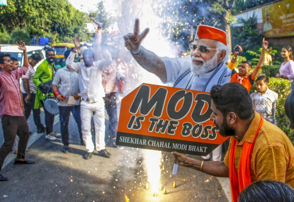 New Delhi: BJP workers celebrate the party's performance in the Haryana Assembly elections at the BJP headquarters in New Delhi on Tuesday, October 8, 2024. (Photo: IANS/Wasim Sarvar)