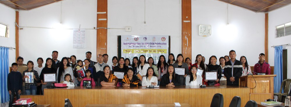 Officials and participants during the International Day of the Girl Child 2024 event in Wokha.