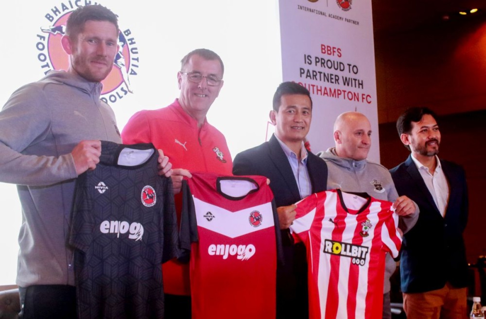 New Delhi: Former footballers Bhaichung Bhutia, Matt Le Tissier, Director of Southampton Football Academy, Andy Martino, and Tom Grevatt, Football Development Manager of Southampton FC, attend the programme for the agreement signing between Bhaichung Bhutia Football Schools and Southampton FC in New Delhi on Thursday, October 03, 2024. (Photo: IANS/Qamar Sibtain)