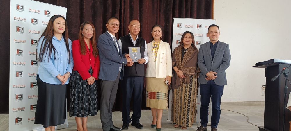 T. Keditsu (3rd from R) seen with her father, Dr. Kezevituo Keditsu (M) for whom her newly released book "The Boy Who Loved Food" was dedicated to, Colo Mero, Social Entrepreneur (3rd from L), Publisher, Vishü Rita Krocha (2nd from L), Adenuo Shirat Luikham (L), Sharon Longchari (2nd from R) and Visato Yhoshü (R)