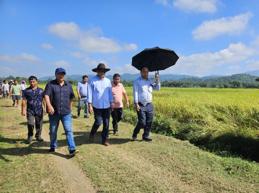 Advisor for Agriculture, Mhathung Yanthan, interacts with department officials during his visit to the Nagaland State Seed Farm, Merapani on November 8.