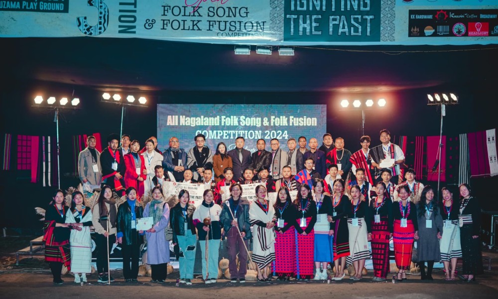 Winners with dignitaries during All Nagaland Open Folksong and Folkfusion competition 2024 at Khuzama on November 23. (Morung Photo)