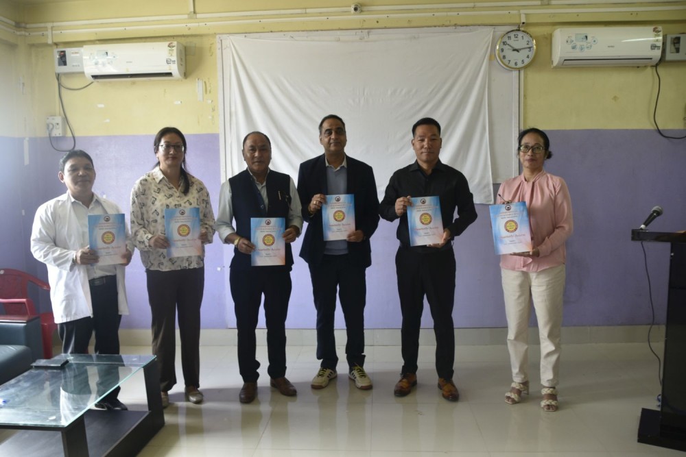Minister Paiwang Konyak and others releases quarterly Access Issue-I at Mon DH on November 23.